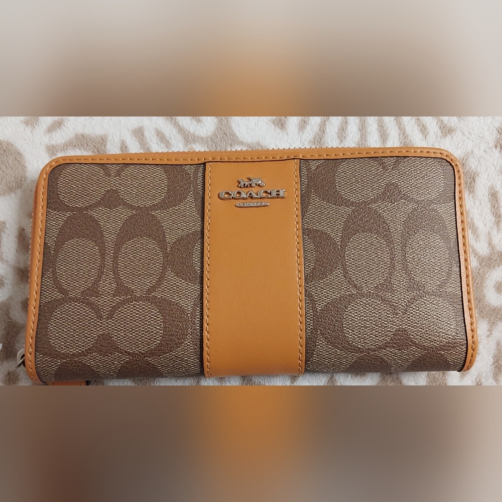 Coach Brown and Orange/Mango Signature Accordion Wallet.